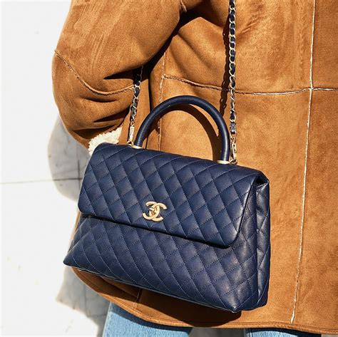 flap bag with top handle chanel price|Chanel trendy top handle.